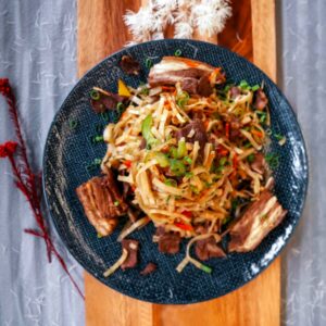 Stir fried handmade noodle with lamb ribs